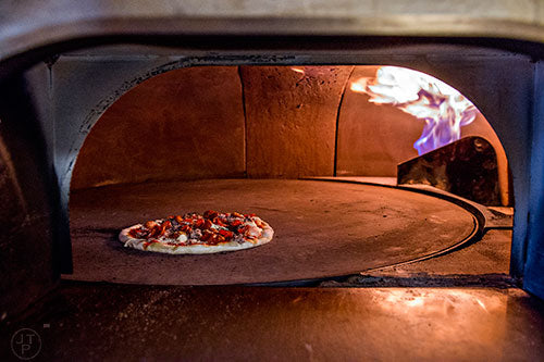 Unlock the Secret to Perfectly Charred Pizza: Harnessing the Power of Fatwood for Your Pizza Oven